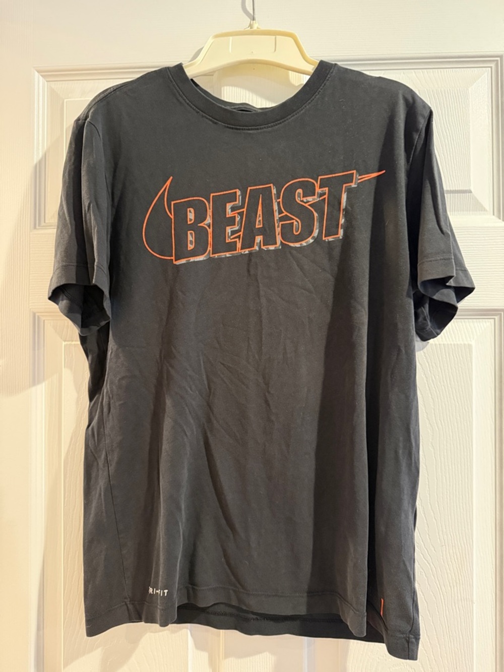 Nike Black Short-Sleeve 'BEAST' Graphic Tee with Orange Logo